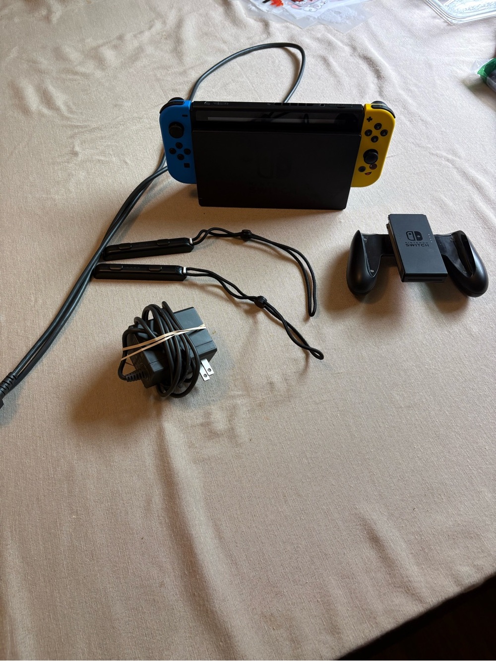 Nintendo Switch with Blue Left and Yellow Right Joy‑Con Controllers